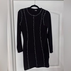 Long sleeve black stretchy dress.